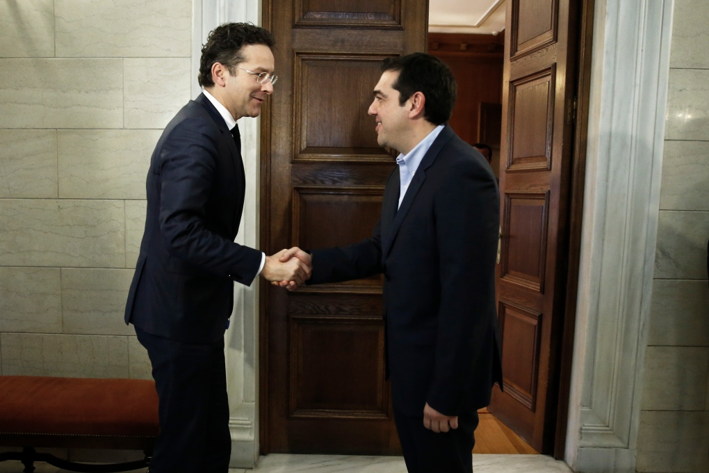 Greek PM talks debt with eurozone official