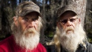 In this undated image released by History, Mitchell Guist, left, and his brother Glenn, from the series "Swamp People," are shown. Assumption Parish Sheriff Mike Waguespack said Mitchell Guist died Monday, May 14, 2012 in a boating accident on the Intracoastal Waterway, near Pierre Part, La. History, which produces the reality show with Original Media, said Guist would have turned 49 on Friday. 