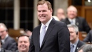 John Baird stands and announces his resignation in the House of Commons in Ottawa on Tuesday, Feb. 3, 2015. (Adrian Wyld / THE CANADIAN PRESS)