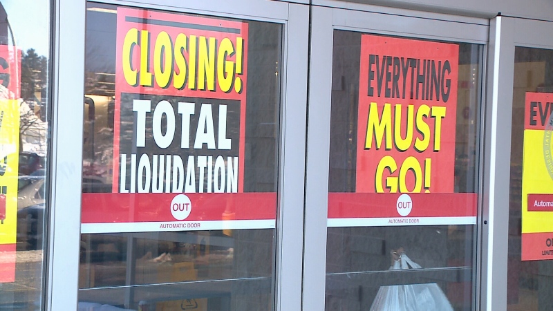 Signs in the windows of the Target store at Billings Bridge Plaza promise savings of up to 30%. (CTV Ottawa)