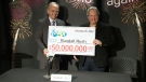 Randall Rush of Lamont, Alberta collects his $50 million Lotto Max jackpot on Friday, Feb. 6, 2015. 