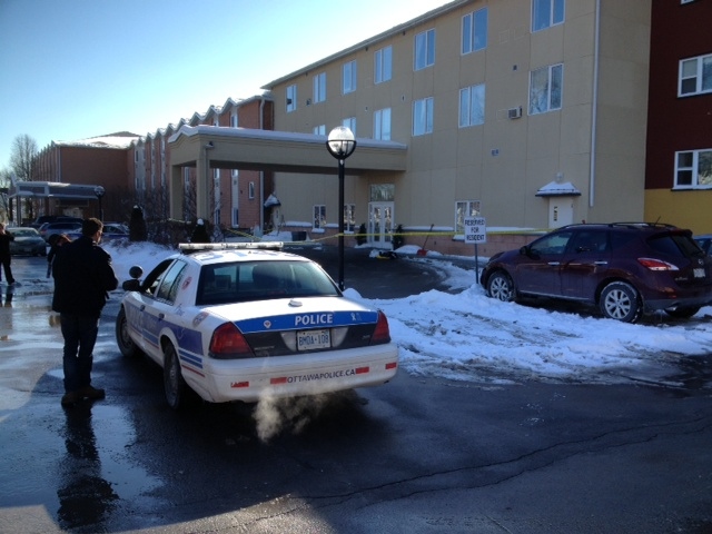  Police cordoned off the scene where a 23-year-old worker fell ten metres from the roof of a three-storey building on Wilson St. on Tuesday, Feb. 10, 2015. (Jim O'Grady/CTV Ottawa) 