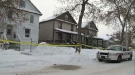 Edmonton police on the scene, after a woman was found dead inside a home Monday, February 9.
