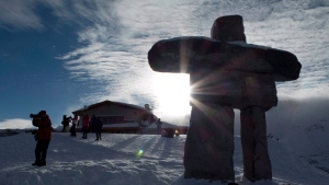 An inukshuk is pictured on top of Whistler mountain in Whistler, B.C., Friday, Dec. 26, 2014. (Jonathan Hayward /  THE CANADIAN PRESS)