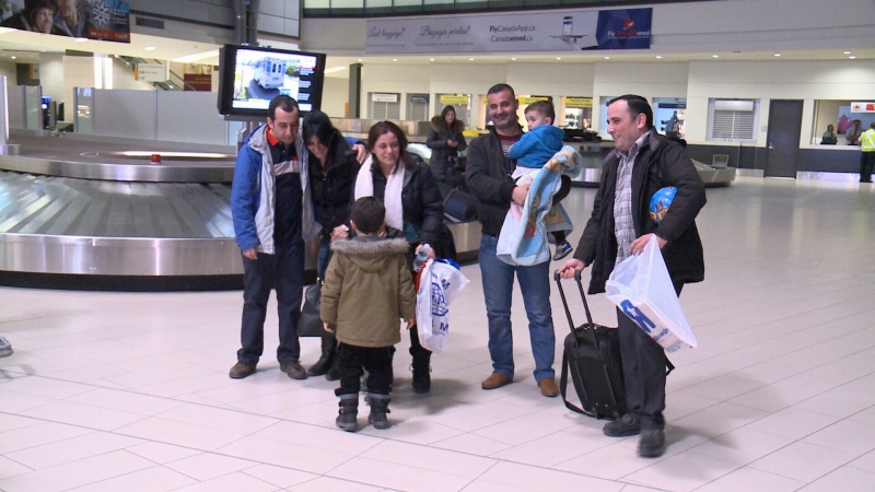 Shadi Al Khalil and his brother Fadi welcome their sister, Shadi Al Salameh and her family, to Canada after they fled the conflict in Syria (Jody Buschlen/CTV Ottawa, February 11, 2015)