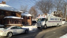 A Barrie police vehicle is parked outside a residence on Monday, Feb. 16, 2015, following a murder near downtown Barrie, Ont. (Keith Cheney / CTV Barrie)