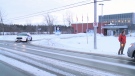 A police cruiser blocks the entrance to the police station on Huntmar Dr. on Tuesday afternoon (CTV Ottawa/Ben Coles, February 17, 2015)