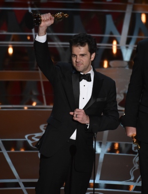 Craig Mann accepts the award for best sound mixing for 'Whiplash' at the Oscars on Sunday, Feb. 22, 2015, at the Dolby Theatre in Los Angeles. (Photo by John Shearer/Invision/AP)