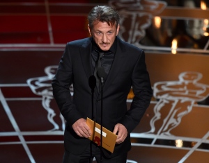 Sean Penn presents the award for best picture at the Oscars on Sunday, Feb. 22, 2015, at the Dolby Theatre in Los Angeles. (AP / Invision / John Shearer)