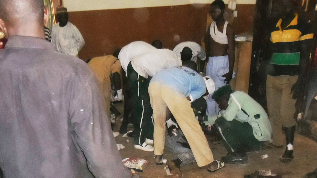 Tending attack victims in Potiskum, Nigeria