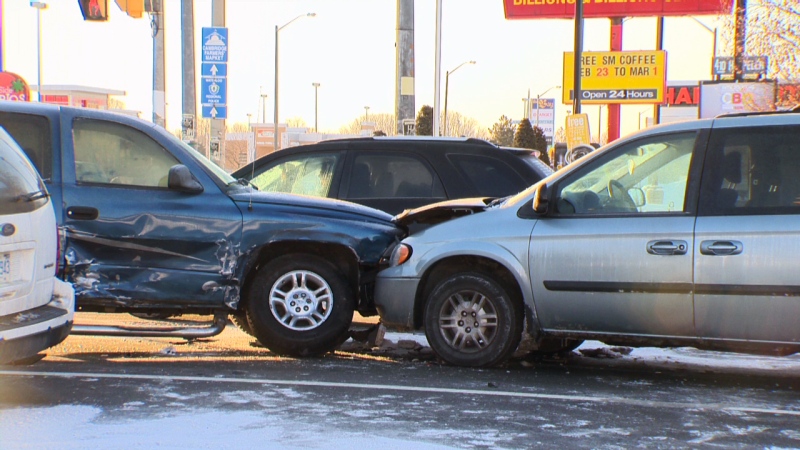 The aftermath of a four-vehicle crash at Hespeler Road and Bishop Street in Cambridge is pictured on Monday, Feb. 23, 2015.