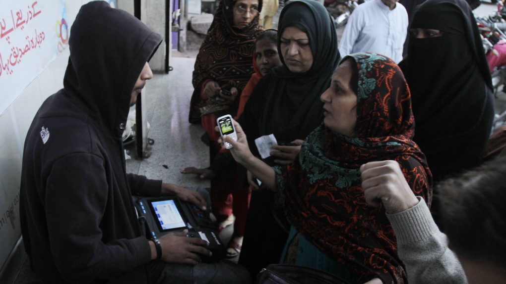 People get their cell phone SIM cards in Pakistan