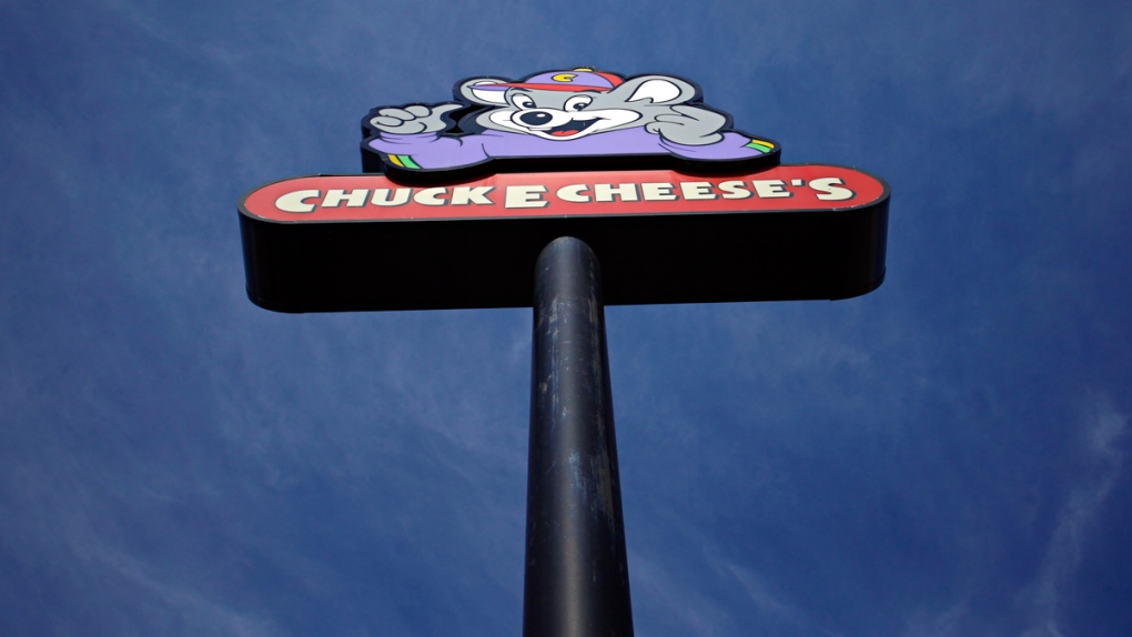 A sign outside a Chuck E. Cheese's location