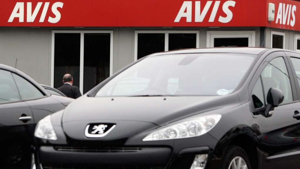 An Avis car rental sign