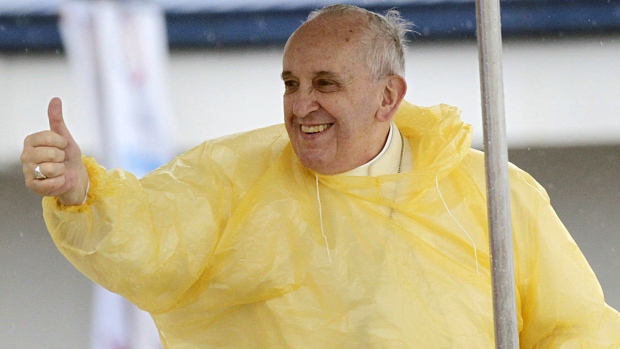 Pope Francis gives a thumbs up
