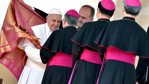 Pope Francis greets bishops at the Vatican