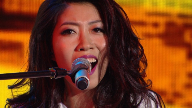 Chinese-Canadian star Wanting Qu performs on stage as W5 followed her during a 25-city tour in China. 