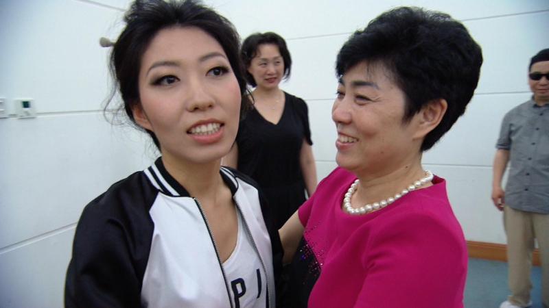 Qu Zhang Mingji, right, with her daughter, pop singer Wanting Qu.