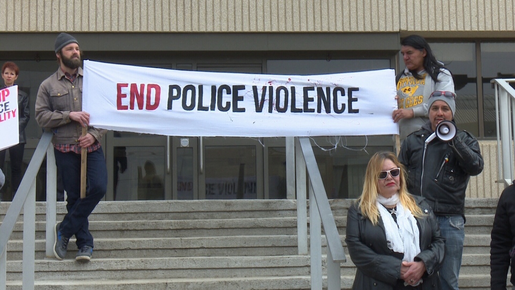 Protesters in Regina gather at police headquarters