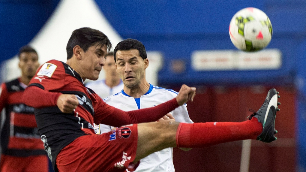 LD Alajuelense's Jose Salvatierra kicks the ball a