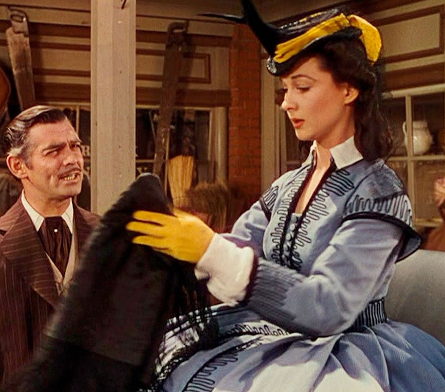 Vivien Leigh is shown wearing a period dress from 'Gone With The Wind....