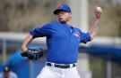 Toronto Blue Jays relief pitcher Brett Cecil throws in the seventh inning of an exhibition baseball game against the Philadelphia Phillies in Dunedin, Fla. on March 26, 2015. (AP / Kathy Willens) 