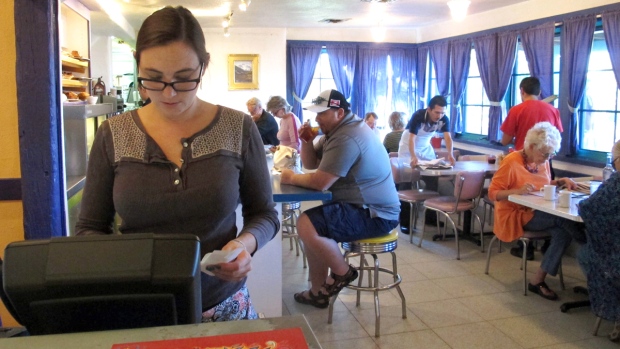 A hostess at a diner in Santa Fe