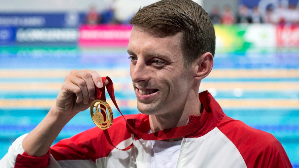Ryan Cochrane displays his gold medal