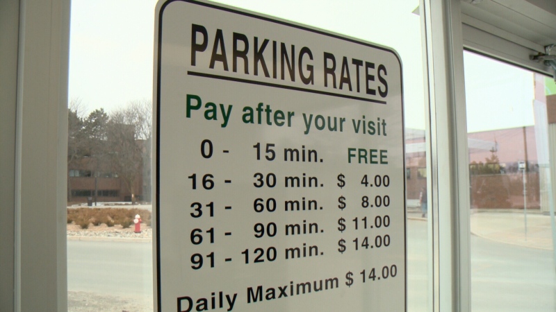 A sign showing the parking rates at the Queensway Carleton Hospital in Ottawa, April 6th, 2015
