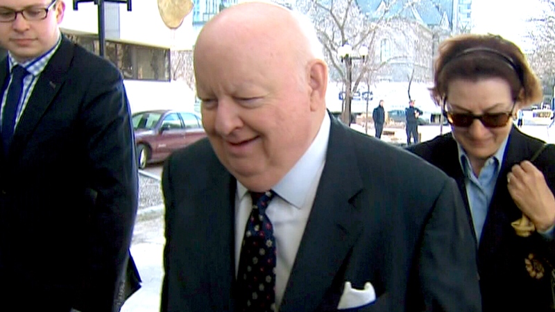 Suspended Sen. Mike Duffy makes his way to court in Ottawa, Tuesday, April 7, 2015.