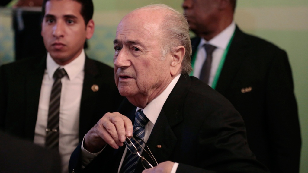 FIFA President Sepp Blatter, centre