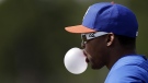 New York Mets non-roster invitee outfielder Marlon Byrd blows a bubble with chewing gum during a spring training baseball workout in Port St. Lucie, Fla. on Thursday, Feb. 21, 2013. (AP / Julio Cortez)