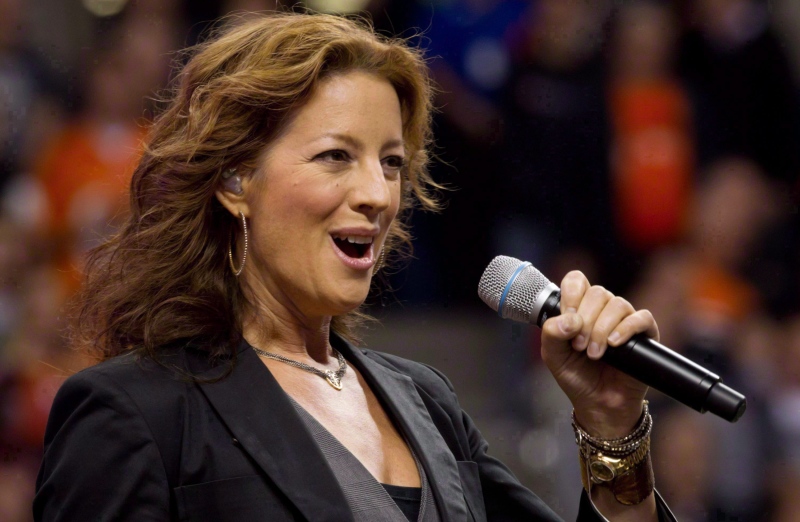 Canadian singer Sarah McLachlan sings the national anthem at B.C. Place stadium in Vancouver, B.C., on September 30, 2011. (Darryl Dyck / The Canadian Press)