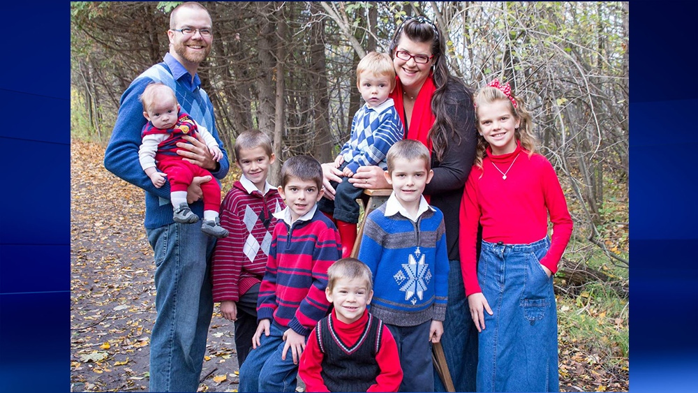 Gavin and Tara Hills with their seven children.