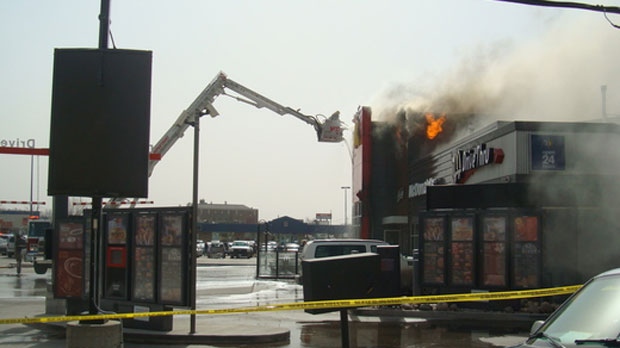Crews fight the fire at a McDonald's in the 900 block of Henderson Highway on April 15, 2015. (Rick Foidart / MyNews)