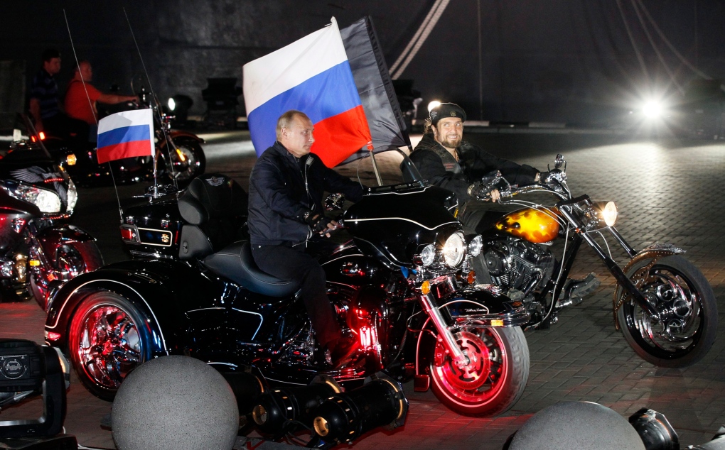 Putin rides three-wheeler with Night Wolves bikers