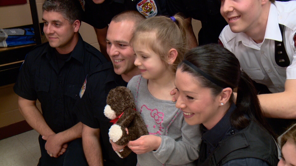 5-yr-old Madeleine Frechette and first responders.