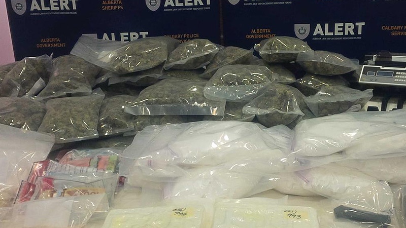 ALERT displays drugs seized by officers in raids as part of a drug investigation on April 16.