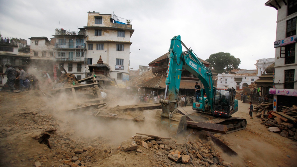 Crane removes debris in Kathmandu, Nepal