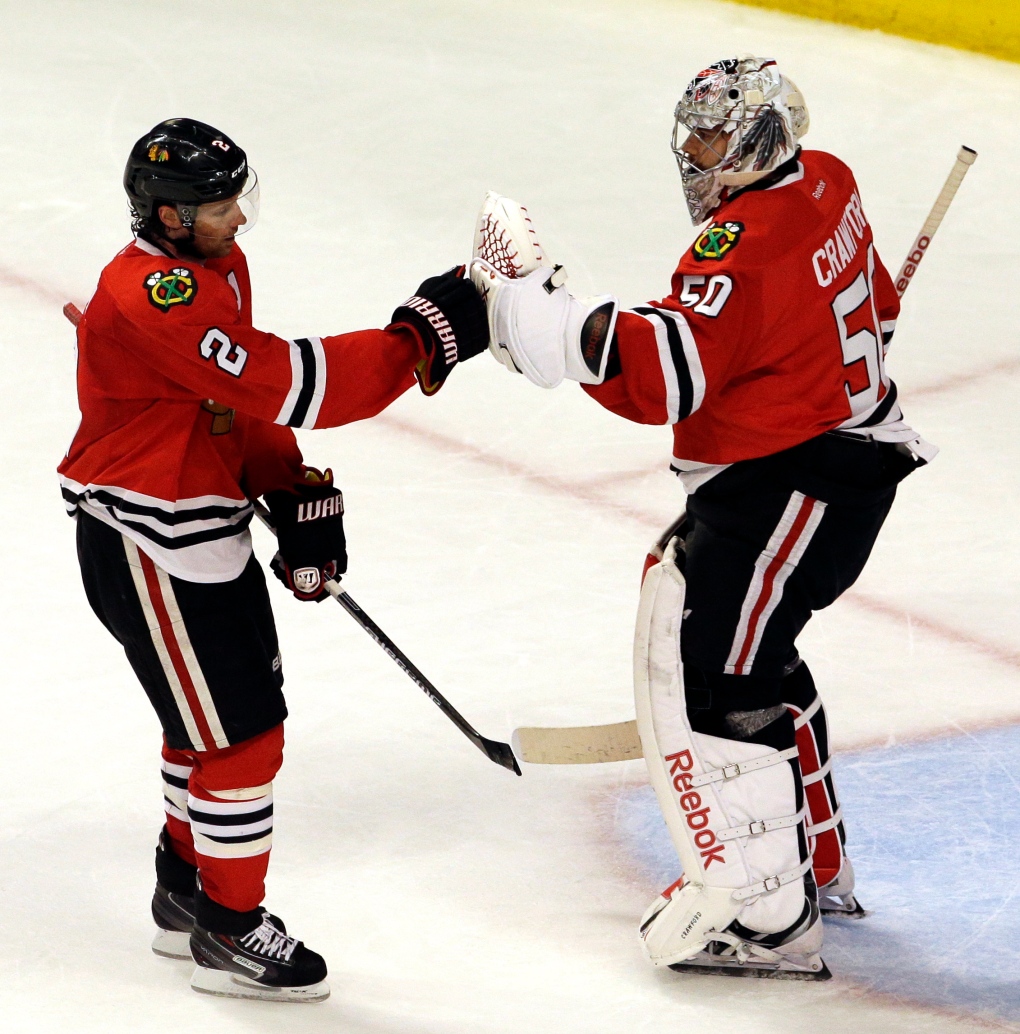 Duncan Keith and Corey Crawford