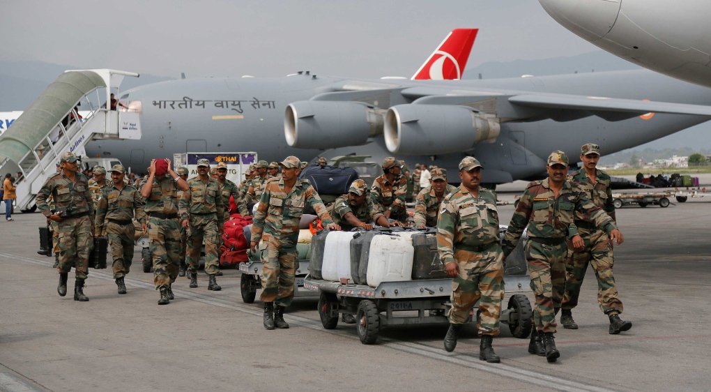 Indian soldiers arrive with supplies in Nepal