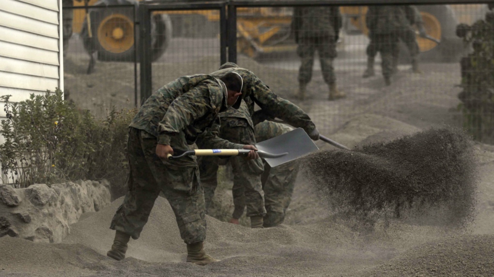 Soldiers clean up ash after Chile volcano