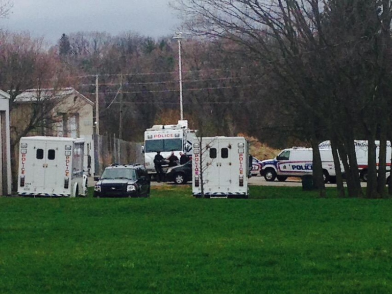 The Emergency Response Unit has set up a command centre during a standoff at a home on Madison Avenue in London, Ont. on Monday, April 27, 2015. (Gerry Dewan / CTV London)