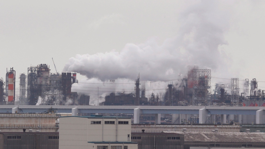 Smoke billows from an oil refinery in Kawasaki