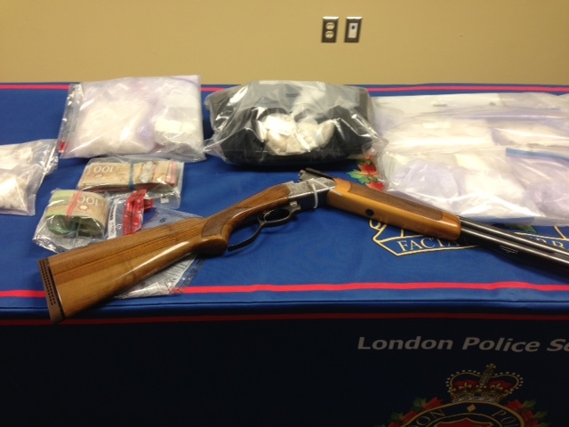 Police display the drugs, cash and weapons seized after a three-month drug investigation in London, Ont. on Thursday, April 30, 2015. (Nick Paparella / CTV London)