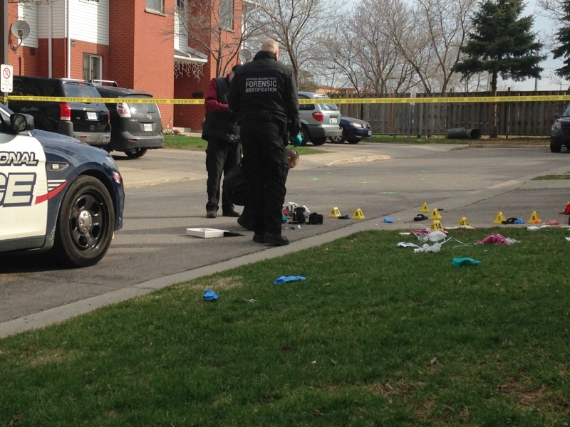 Waterloo Regional Police and Ontario's Special Investigations Unit investigate a shooting and stabbing on Morning Calm Drive in Cambridge on Thursday, April 30, 2015. (Nicole Lampa / CTV Kitchener)