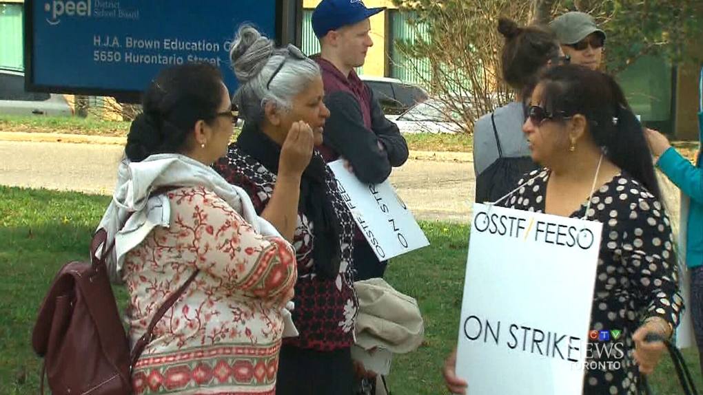 Striking teachers in Peel