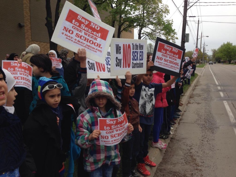 Hundreds of parents and students protested outside Northwood Public School in Windsor, Ont., on Tuesday, May 5, 2015. (Stefanie Masotti / CTV Windsor)