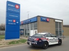 Waterloo Regional Police investigate a bank robbery on Dundas Street in Cambridge on Tuesday, May 5, 2015. (Brian Dunseith / CTV Kitchener)