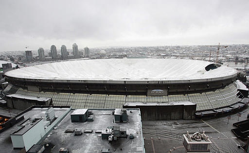 The collapsed BC Place Stadium roof is shown after a tear in the inflated roof caused it to loose air pressure, in Vancouver, B.C. on Friday January 5, 2007. (CP PHOTO/Chuck Stoody)